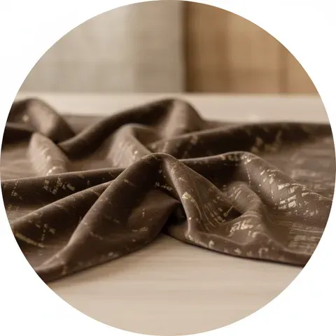 Detail jahitan pada bantal sofa dari kain impor premium.